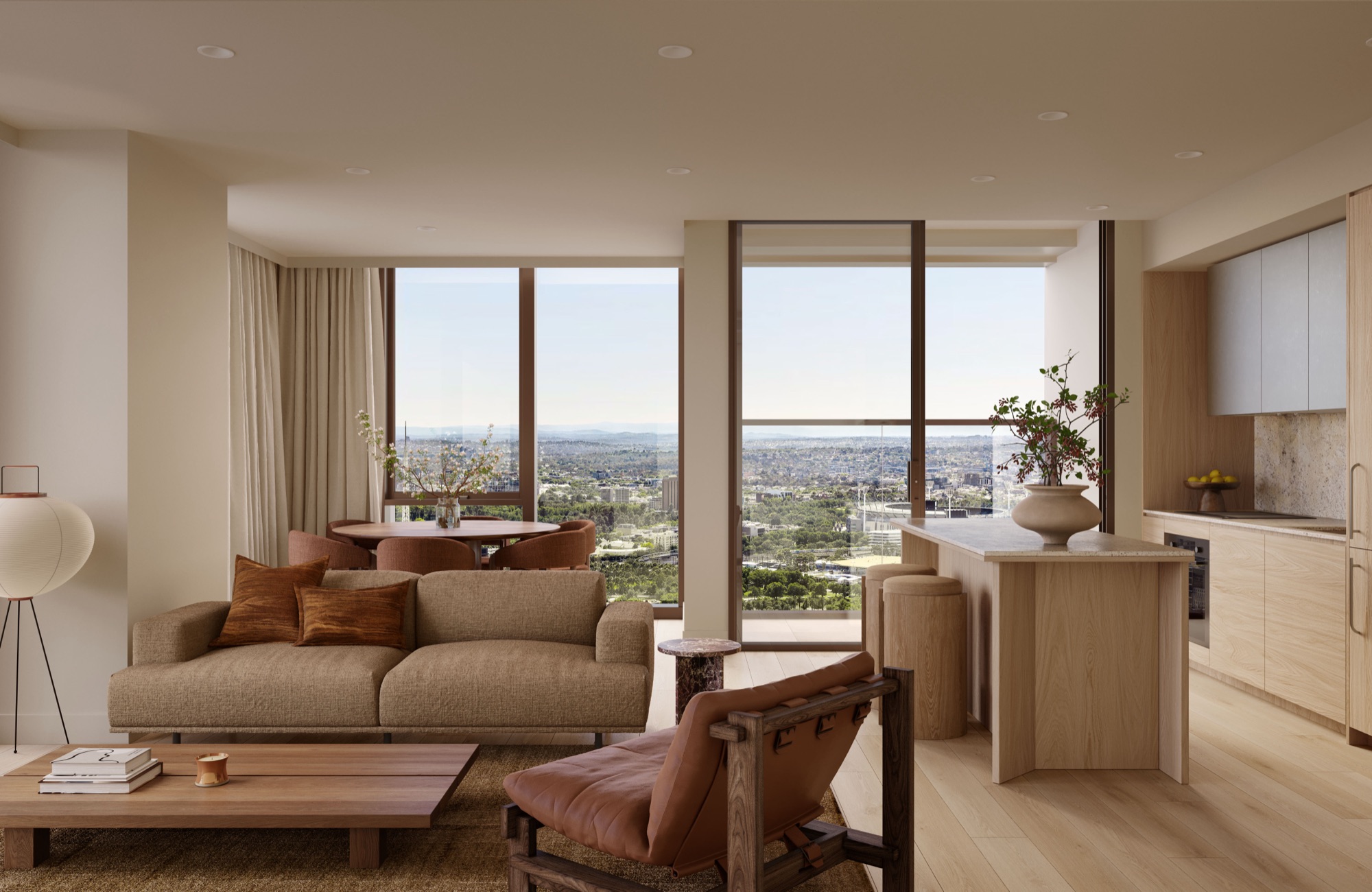 A warm living room framed by floor-to-ceiling glass